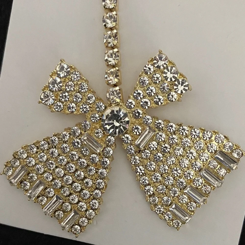 Glass & Rhinestones Large Bow Dangle Earrings in Gold Tone